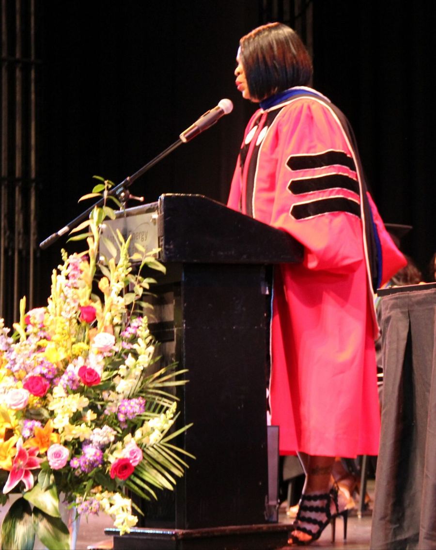 Dr. Sheila at the podium